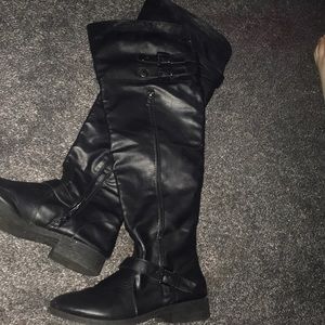 Black leather knee high boots
